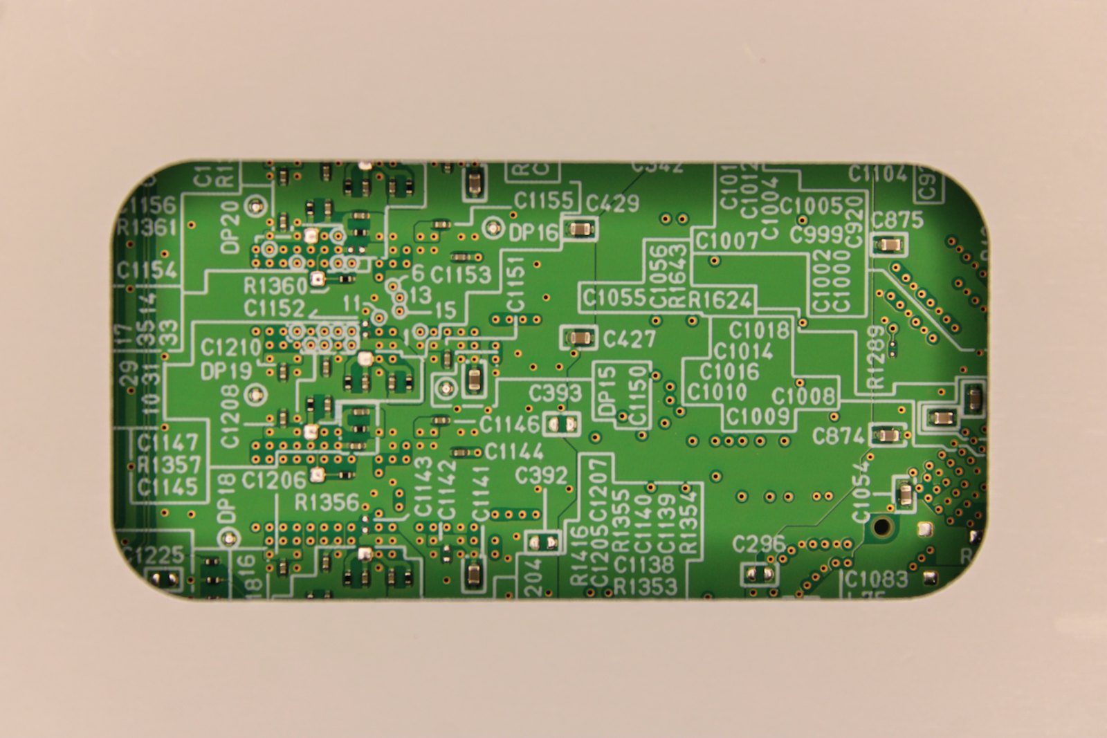 Close-up of a populated green circuit board
